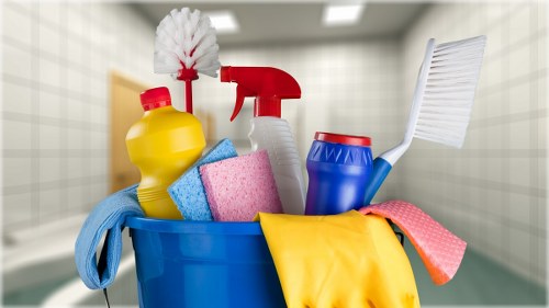 Kitchen surfaces being cleaned after builders work in London